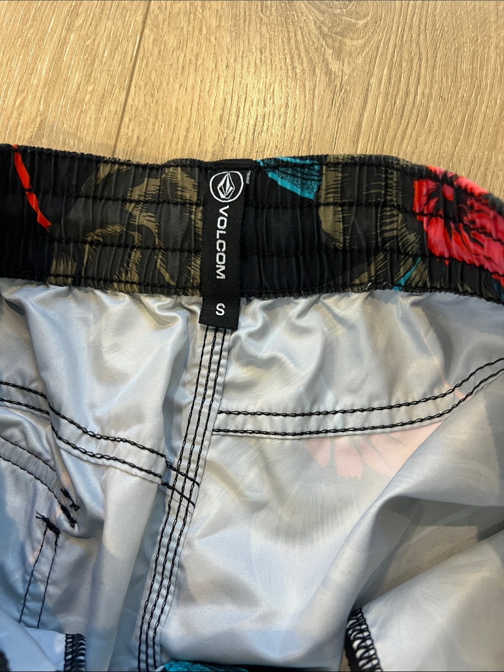 Volcom Black Floral Board Shorts with Teal and Red Accents - Picture 2 of 2